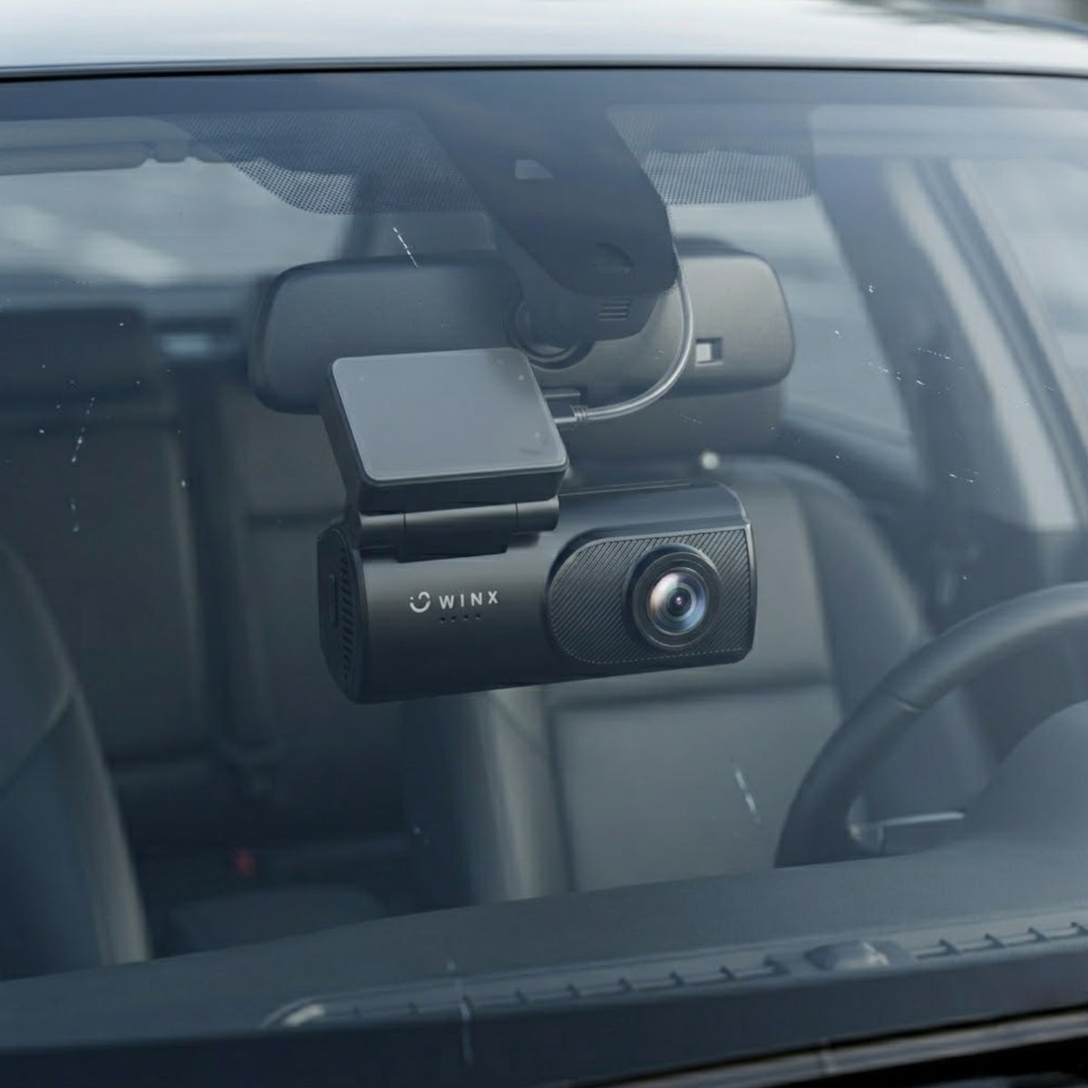 Dash cam mounted on windscreen