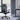ThunderX3 XTC Pro 360 Ergonomic Mesh Chair - chair at a standing desk in a modern home office